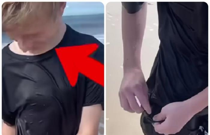 He gets hit by a wave, looks inside his pocket and finds this