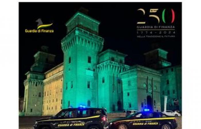 Estense Castle in Ferrara illuminated in yellow and green for the 250 years of the Guardia di Finanza