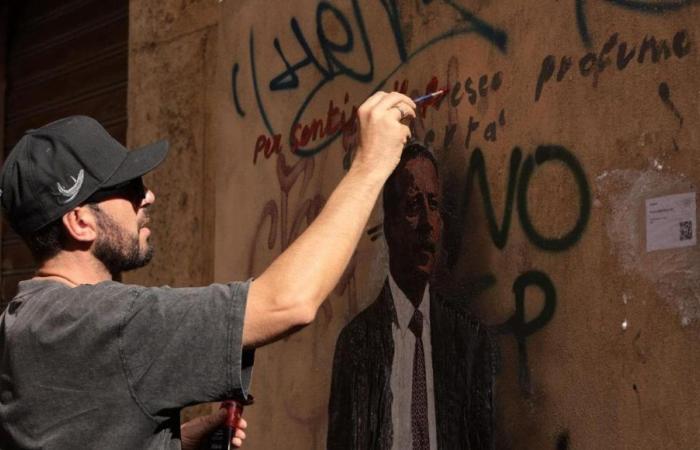 The return of Tvboy to Palermo, the street artist restores his murals: from Santa Rosalia to Peppino Impastato
