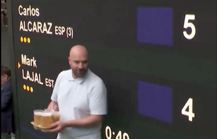 Man wanders disoriented on Wimbledon centre court with tray of beers: security intervenes