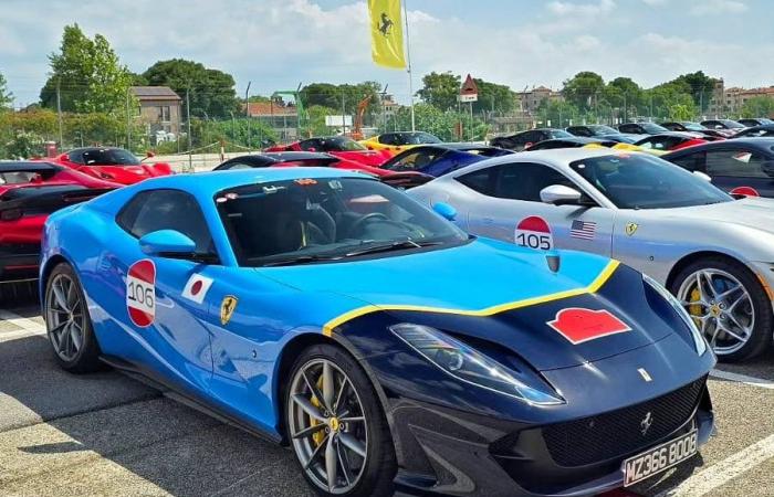 Parade of 125 Ferraris from all over the world in the center of Thiene