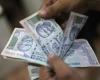 Rupee crushed by dollar’s rise on Fed outlook, counts on RBI’s help