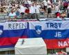 “Trst je nas” on a Slovenian flag during the match against Serbia: controversy erupts