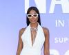 Naomi Campbell lights up the opening of her exhibition in white