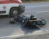 one motorcyclist is injured on the ground, the other gets up and runs away